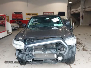 2020 Toyota Tacoma SR with VIN 3TYRX5GN5LT005461, listed as a IAAI auction lot 42020692 with 71,548 mi miles and . Bid and sale history available at DreamBid. Image 12.