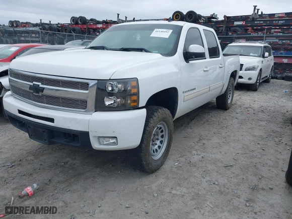2009 Chevrolet Silverado 1500 LTZ with VIN 3GCEK33MX9G111454, listed as a IAAI auction lot 41148492 with 303,878 mi miles. Bid and sale history available at carsss.com. Image 18.