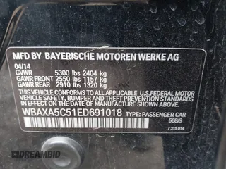 2014 BMW 5 Series 535d with VIN WBAXA5C51ED691018, listed as a IAAI auction lot 41887112 with 174,684 mi miles and . Bid and sale history available at carsss.com. Image 9.