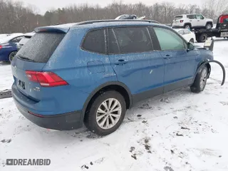 2018 Volkswagen Tiguan S with VIN 3VV0B7AX8JM081263, listed as a IAAI auction lot 41245308 with 58,778 mi miles. Bid and sale history available at carsss.com. Image 4.