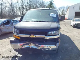 2019 Chevrolet Express Cargo Van with VIN 1GCWGAFP9K1232092, listed as a IAAI auction lot 41807484 with 81,302 mi miles. Bid and sale history available at carsss.com. Image 6.