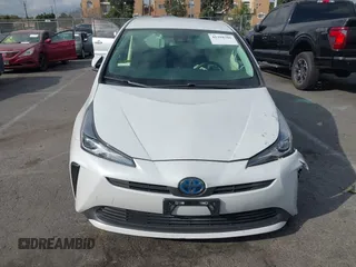 2021 Toyota Prius L Eco with VIN JTDKAMFUXM3144845, listed as a IAAI auction lot 41358306 with Not provided miles and . Bid and sale history available at DreamBid. Image 12.