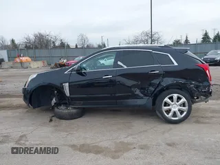 2015 Cadillac SRX Premium Collection with VIN 3GYFNGE37FS556860, listed as a IAAI auction lot 41854634 with 170,808 mi miles and . Bid and sale history available at DreamBid. Image 14.