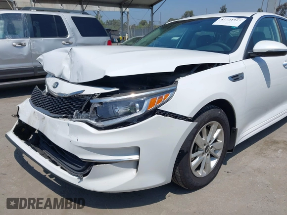 2016 Kia Optima LX with VIN 5XXGT4L31GG081280, listed as a IAAI auction lot 42721927 with 77,980 mi miles and . Bid and sale history available at DreamBid. Image 13.