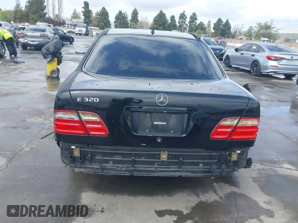 2000 Mercedes-Benz E-Class with VIN WDBJF65JXYA997410, listed as a IAAI auction lot 41939485 with 158,559 mi miles. Bid and sale history available at carsss.com. Image 6.