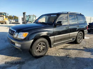 2000 Lexus LX 470 with VIN JT6HT00W3Y0090164, listed as a Copart auction lot 41338515 with 209,338 mi miles and Salvage Title. Bid and sale history available at carsss.com. Image 1.