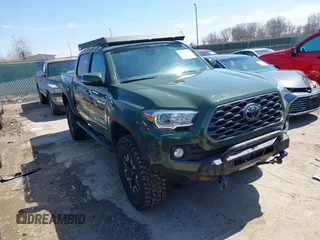 2021 Toyota Tacoma 4WD SR with VIN 3TMCZ5ANXMM382874, listed as a IAAI auction lot 41965388 with 62,178 mi miles. Bid and sale history available at carsss.com. Image 1.