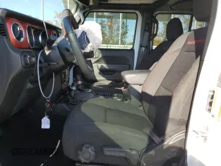 2022 Jeep Wrangler Unlimited Rubicon with VIN 1C4JJXFG2NW125360, listed as a Copart auction lot 76773624 with 22,978 mi miles and Salvage title. Bid and sale history available at DreamBid. Image 7.