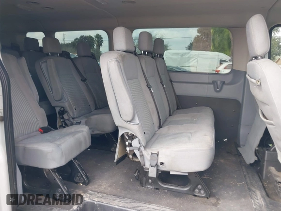 2019 Ford Transit Passenger XL with VIN 1FBZX2YM5KKA48112, listed as a IAAI auction lot 41518013 with 163,856 mi miles and . Bid and sale history available at DreamBid. Image 8.