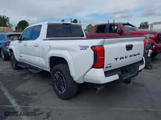 2024 Toyota Tacoma 4WD SR5 with VIN 3TYLB5JNXRT007339, listed as a IAAI auction lot 41432778 with 4,038 mi miles. Bid and sale history available at carsss.com. Image 3.