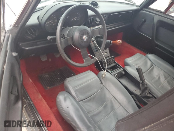 1990 Alfa Romeo Spider z VIN ZARBA12T0L6002373, wystawiony jako Copart lot #75362404 z przebiegiem 73 479 mil mil oraz Nie do naprawy • Non repairable. Historia ofert i sprzedaży dostępna na DreamBid. Obrazek 8.