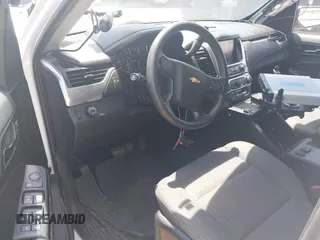2020 Chevrolet Tahoe Commercial with VIN 1GNLCDECXLR154849, listed as a IAAI auction lot 42050778 with 124,771 mi miles and . Bid and sale history available at DreamBid. Image 18.