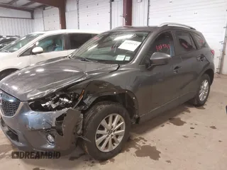 2015 Mazda CX-5 Touring with VIN JM3KE4CY3F0460501, listed as a IAAI auction lot 41889743 with 160,367 mi miles. Bid and sale history available at carsss.com. Image 2.