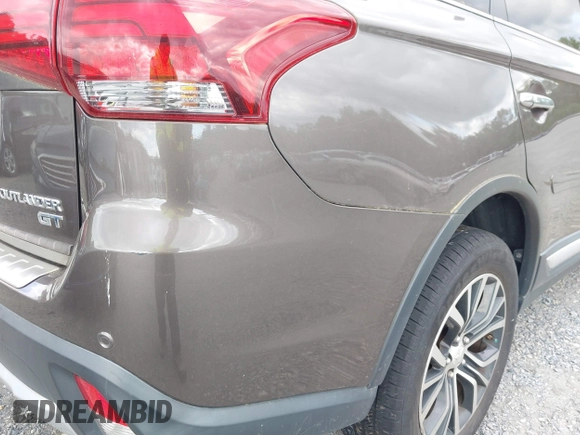 2016 Mitsubishi Outlander GT z VIN JA4JZ4AXXGZ002867, wystawiony jako IAAI lot #42327299 z przebiegiem 85 538 mil mil oraz . Historia ofert i sprzedaży dostępna na DreamBid. Obrazek 20.
