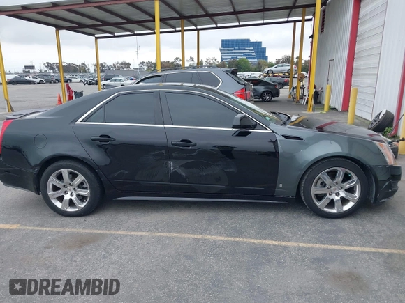 2011 Cadillac CTS Luxury with VIN 1G6DF5EYXB0103430, listed as a IAAI auction lot 42105337 with 205,069 mi miles and . Bid and sale history available at DreamBid. Image 13.