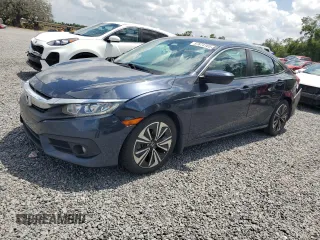 2017 Honda Civic EX-L z VIN 19XFC1F74HE001697, wystawiony jako Copart lot #57874165 z przebiegiem 119 366 mil mil oraz Szkoda całkowita • Salvage title. Historia ofert i sprzedaży dostępna na DreamBid. Obrazek 1.