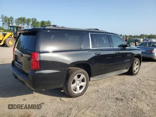 2015 Chevrolet Suburban LT with VIN 1GNSCJKC7FR163625, listed as a Copart auction lot 63949863 with 117,448 mi miles and . Bid and sale history available at DreamBid. Image 3.