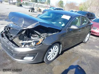 2014 Kia Optima EX with VIN 5XXGN4A78EG320367, listed as a IAAI auction lot 41858824 with 216,987 mi miles. Bid and sale history available at carsss.com. Image 2.