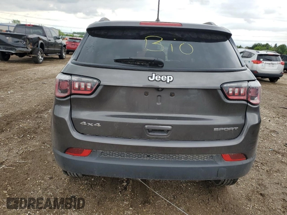 2018 Jeep Compass Sport с VIN 3C4NJDABXJT320991, выставлен на аукционе Copart как лот 58639125 с пробегом Не указан миль и Списание • Salvage title. История ставок и продаж доступна на DreamBid. Изображение 6.