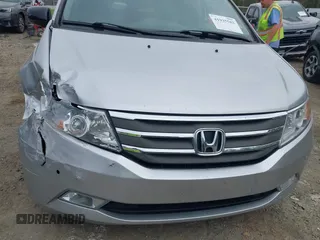 2012 Honda Odyssey Touring with VIN 5FNRL5H98CB026754, listed as a IAAI auction lot 41935562 with 165,626 mi miles. Bid and sale history available at carsss.com. Image 11.