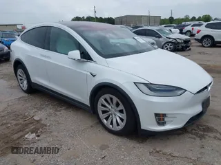 2020 Tesla Model X Long Range with VIN 5YJXCBE23LF233484, listed as a IAAI auction lot 41886062 with 1 mi miles. Bid and sale history available at carsss.com. Image 1.