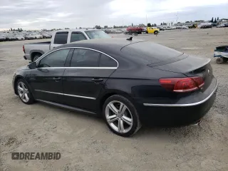 2013 Volkswagen CC R-Line with VIN WVWBP7AN5DE567272, listed as a Copart auction lot 76392474 with 98,450 mi miles and Salvage Title. Bid and sale history available at carsss.com. Image 2.