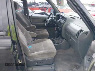 1999 Isuzu Trooper S with VIN JACDJ58X5X7902821, listed as a IAAI auction lot 40762329 with 182,773 mi miles and . Bid and sale history available at DreamBid. Image 5.