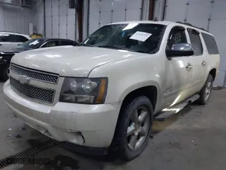 2009 Chevrolet Suburban LTZ with VIN 1GNFK36389R179802, listed as a IAAI auction lot 41239731 with 224,138 mi miles. Bid and sale history available at carsss.com. Image 2.