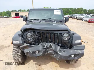 2020 Jeep Wrangler Unlimited Sport S with VIN 1C4HJXDN9LW218468, listed as a IAAI auction lot 42490190 with 114,542 mi miles and . Bid and sale history available at DreamBid. Image 12.