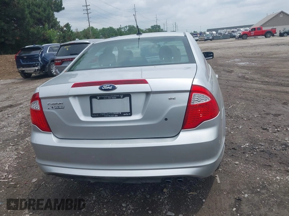 2012 Ford Fusion SE z VIN 3FAHP0HA3CR421636, wystawiony jako IAAI lot #42454385 z przebiegiem 138 282 mil mil oraz . Historia ofert i sprzedaży dostępna na DreamBid. Obrazek 16.