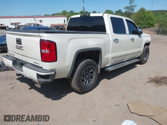 2015 GMC Sierra 1500 Denali with VIN 3GTU2WEJ7FG460695, listed as a IAAI auction lot 42023393 with 116,761 mi miles and . Bid and sale history available at DreamBid. Image 4.