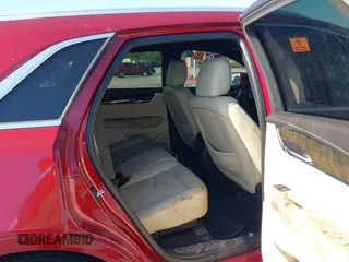 2019 Cadillac XT5 FWD with VIN 1GYKNARS9KZ173920, listed as a IAAI auction lot 42321141 with Not provided miles and . Bid and sale history available at DreamBid. Image 8.