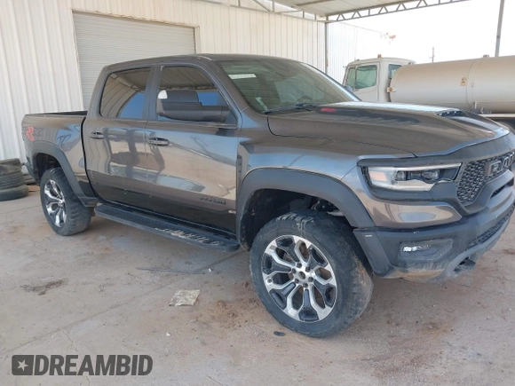 2022 Ram 1500 TRX with VIN 1C6SRFU97NN353587, listed as a IAAI auction lot 42174702 with 35,305 mi miles and . Bid and sale history available at DreamBid. Image 1.