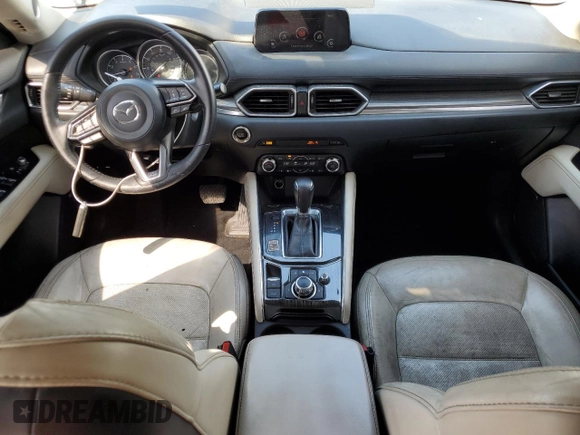 2018 Mazda CX-5 Grand Touring with VIN JM3KFBDM6J0345848, listed as a Copart auction lot 61587865 with 107,193 mi miles and Salvage title. Bid and sale history available at DreamBid. Image 8.