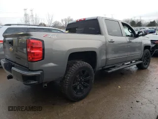 2017 Chevrolet Silverado 1500 LT with VIN 3GCUKREC0HG287527, listed as a Copart auction lot 84900274 with 121,617 mi miles and Salvage Title. Bid and sale history available at DreamBid. Image 3.