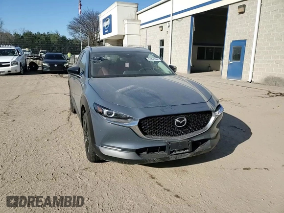 2022 Mazda CX-30 S Carbon Edition с VIN 3MVDMBCL7NM429131, выставлен на аукционе Copart как лот 42421695 с пробегом 21 825 миль миль и Списание • Salvage title. История ставок и продаж доступна на DreamBid. Изображение 10.