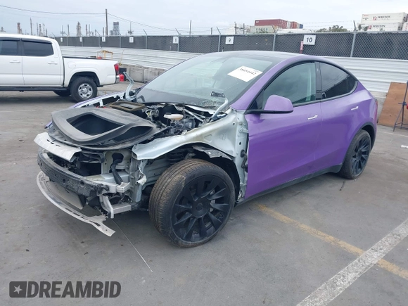 2021 Tesla Model Y Long Range with VIN 5YJYGDEE7MF224531, listed as a IAAI auction lot 38454442 with 52,408 mi miles. Bid and sale history available at carsss.com. Image 20.