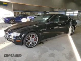 2005 Maserati Quattroporte z VIN ZAMCE39A050015127, wystawiony jako Copart lot #85957714 z przebiegiem 88 278 mil mil oraz Czysty tytuł • Clean title. Historia ofert i sprzedaży dostępna na DreamBid. Obrazek 1.