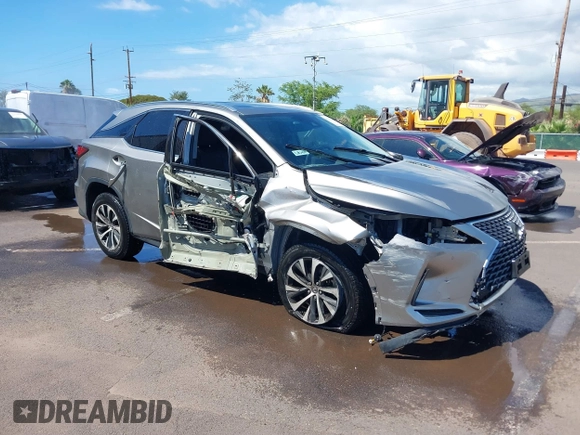 2020 Lexus RX with VIN 2T2HZMAA9LC163081, listed as a IAAI auction lot 41627232 with 38,153 mi miles. Bid and sale history available at carsss.com. Image 1.