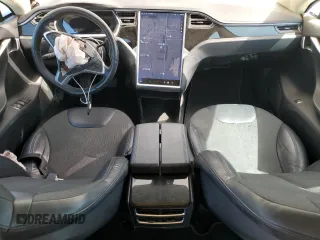 2013 Tesla Model S with VIN 5YJSA1AC9DFP10400, listed as a Copart auction lot 64096555 with 165,166 mi miles and Salvage title. Bid and sale history available at DreamBid. Image 8.