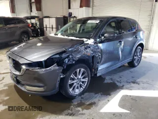 2019 Mazda CX-5 Grand Touring with VIN JM3KFBDM8K0559192, listed as a Copart auction lot 44441985 with 68,855 mi miles and Salvage title. Bid and sale history available at DreamBid. Image 1.