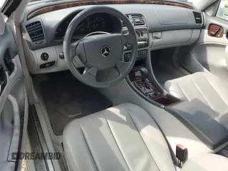 1999 Mercedes-Benz CLK 320/430 with VIN WDBLJ70G8XF077284, listed as a Copart auction lot 72495364 with 114,533 mi miles and Salvage Title. Bid and sale history available at carsss.com. Image 8.