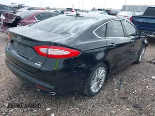 2015 Ford Fusion SE with VIN 3FA6P0H92FR205388, listed as a IAAI auction lot 41699606 with 69,597 mi miles. Bid and sale history available at carsss.com. Image 4.