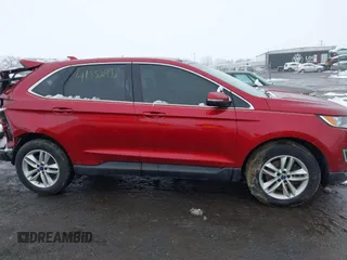2015 Ford Edge SEL with VIN 2FMTK4J82FBC08483, listed as a IAAI auction lot 41552998 with 124,720 mi miles. Bid and sale history available at carsss.com. Image 14.