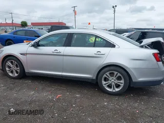 2015 Ford Taurus SEL with VIN 1FAHP2E91FG137696, listed as a IAAI auction lot 42168950 with 81,050 mi miles and . Bid and sale history available at DreamBid. Image 14.