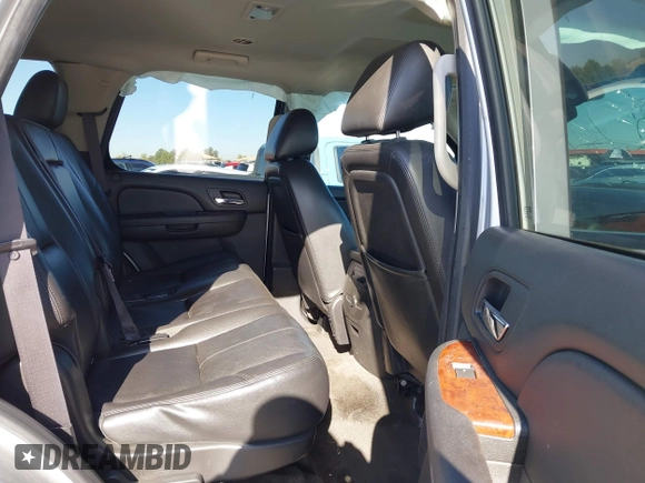 2013 Chevrolet Tahoe LT with VIN 1GNSKBE01DR157083, listed as a IAAI auction lot 41759189 with 153,403 mi miles and . Bid and sale history available at DreamBid. Image 8.