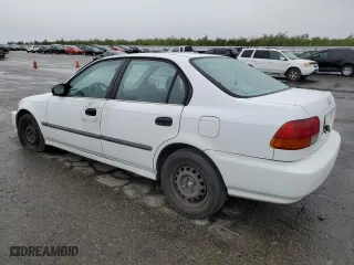 1996 Honda Civic DX with VIN 1HGEJ6628TL016028, listed as a Copart auction lot 82329494 with 158,084 mi miles and Salvage Title. Bid and sale history available at carsss.com. Image 2.