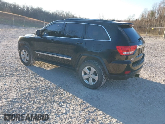 2012 Jeep Grand Cherokee Laredo with VIN 1C4RJFAG3CC246577, listed as a IAAI auction lot 41807693 with 164,574 mi miles. Bid and sale history available at carsss.com. Image 3.