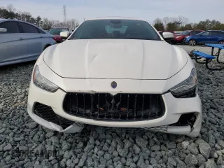 2017 Maserati Ghibli with VIN ZAM57XSAXH1217301, listed as a Copart auction lot 40090954 with 107,514 mi miles. Bid and sale history available at carsss.com. Image 5.