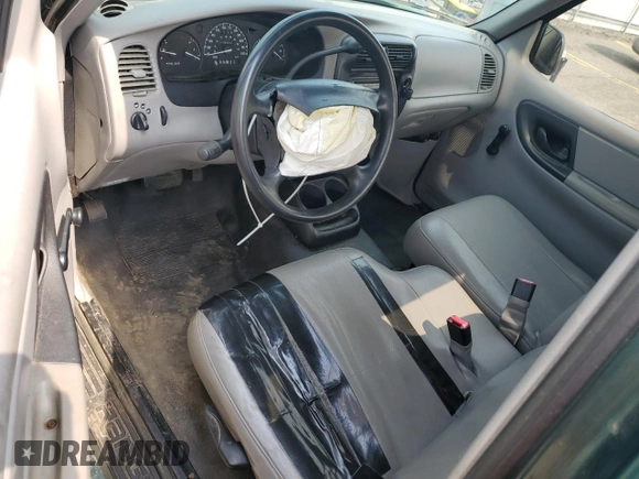 2000 Ford Ranger XLT with VIN 1FTYR10X8YTA65040, listed as a Copart auction lot 59956065 with 112,532 mi miles and Salvage title. Bid and sale history available at DreamBid. Image 8.